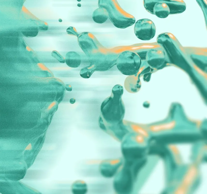 Abstract teal liquid droplets in motion